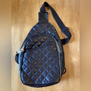 Black Odiva crossbody purse with gold zipper pull. Like new condition!